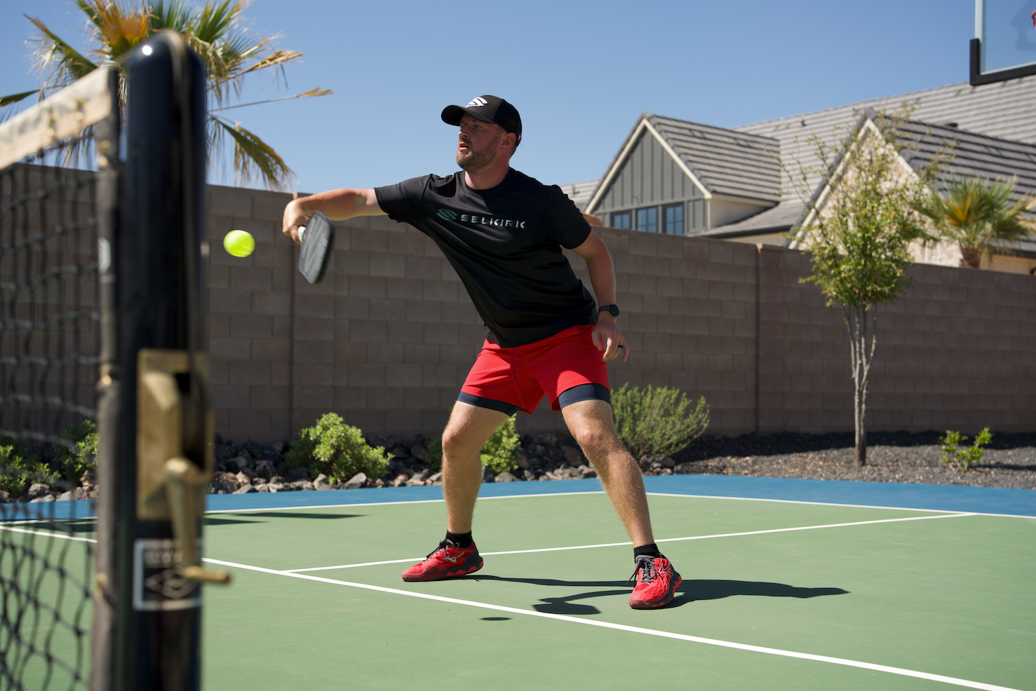 What happens if a pickleball ball lands on your side of the net and then bounces back over the net, without ever being touched by someone on your team? Here is a breakdown of the official rule to follow when this happens (sometimes called the Over and Back Rule).