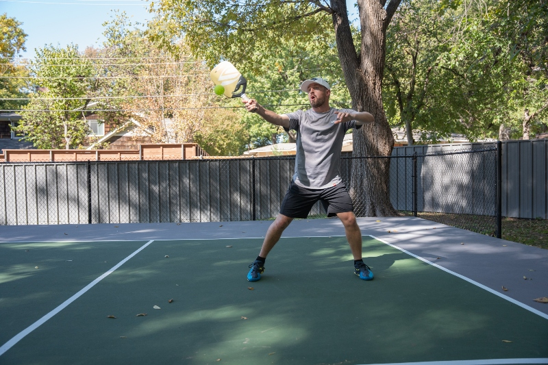 As the weather starts to warm up in many areas, you may be wondering if you should continue playing inside or move to an outside pickleball court (or both!). There are many differences between outdoor vs. indoor pickleball play.